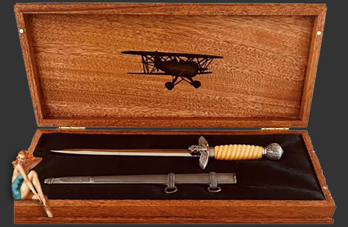 If you might have a Special Etched Dress Bayonet or two, I am now offering a beautiful Presentation Box so that you can add some visual enhancement as well as personal satisfaction in your bayonet display.

All Presentation Boxes are handmade. Tops are hard to find Birds Eye Maple. Bottoms of Rare Tiger Maple (see pictures) and have a recessed interior covered in a black satin or felt to further increase the appearance of your bayonet* collectible.